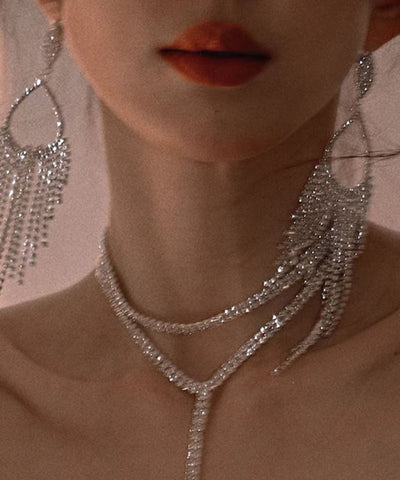 Pendientes de plata de ley con borlas y circonitas en forma de gota de agua de Art Silk 