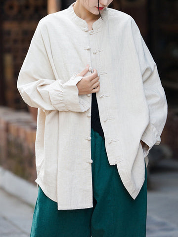 Blusas plisadas de color liso con cuello alto, mangas murciélago y botones de rana chinos sueltos. 