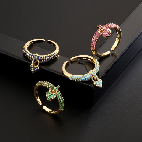 "Zirconia Love Knot: Heart Charm Rings"
