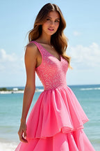 Vestido de fiesta largo en capas con cuentas en rosa intenso y corte A