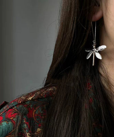 Pendientes colgantes de mariposa ahuecados de plata de ley con seda retro 