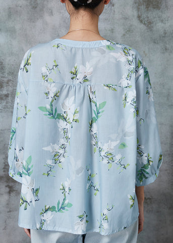 Blusa de algodón con estampado extragrande en azul claro y mangas tipo pulsera 