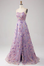 Vestido de fiesta de tul color malva con abertura frontal y tirantes finos en forma de A