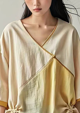 Brazalete de lino con patchwork y cordones en beige 