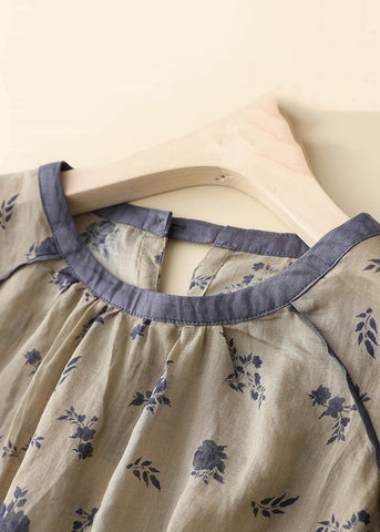 Camiseta holgada de algodón con botones y estampado caqui, mangas con pulsera 