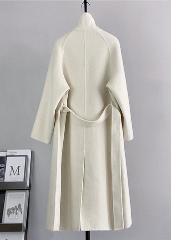 Abrigos de lana blancos de moda con cuello alto y lazo en la cintura para invierno 