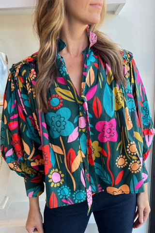Blusa con mangas abullonadas y estampado floral verde vibrante 
