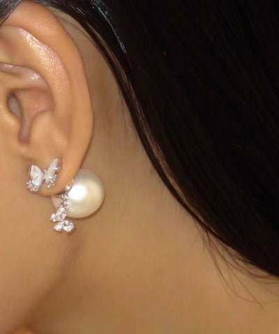 Pendientes Vogue con borlas florales de circonita y mariposa de cobre blanco 