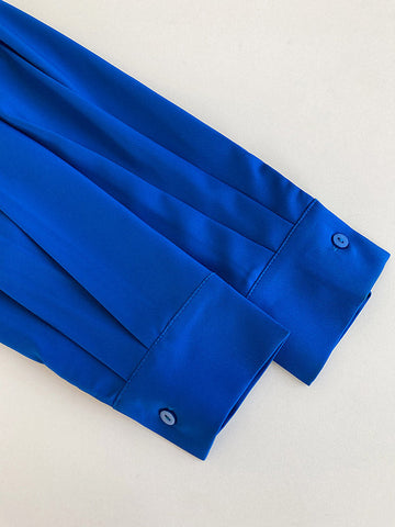 Blusa elegante de manga larga en tres colores lisos 
