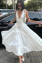 Silky Hollow V-Neck Flowy Pendulum Maxi Dress