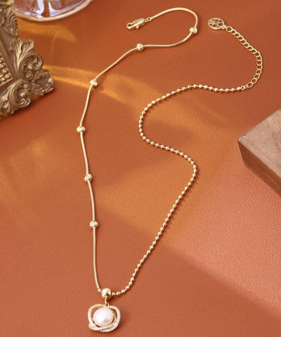 Collar con colgante de perla y circonitas doradas de plata esterlina a la moda 