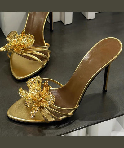 Schwarze Stiletto-Sandalen aus Kunstleder mit Blumenmuster 