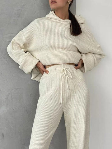 Conjunto de dos piezas de suéter holgado de color sólido con cuello redondo, capucha y mangas largas + pantalón con cordón ajustable 