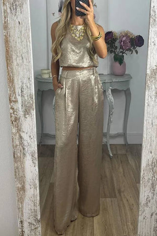Conjunto de camiseta corta con botones en la espalda de tela metalizada Rita y pantalones anchos con bolsillos y cintura elástica 