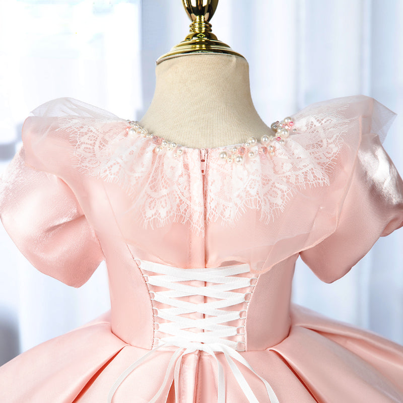 Elegantes rosa Prinzessinnenkleid mit Puffärmeln für Babys und Kleinkinder – auch ideal zur Erstkommunion 