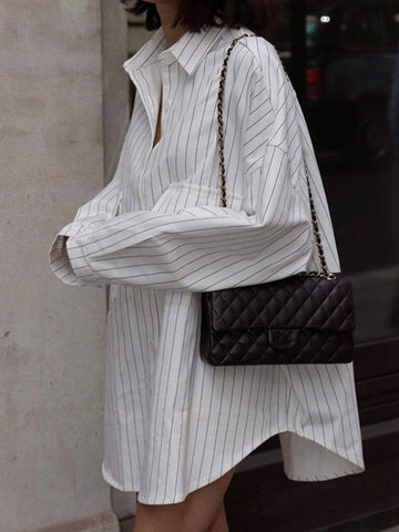 Blusas de solapa a rayas con aberturas laterales, mangas largas y corte irregular 