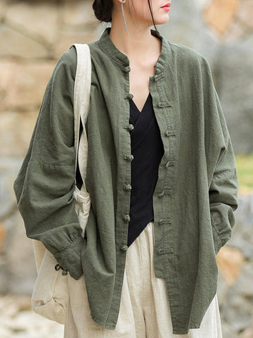 Blusas plisadas de color liso con cuello alto, mangas murciélago y botones de rana chinos sueltos. 