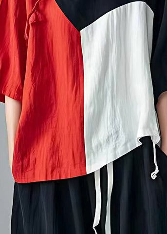 Neu Schwarzes asymmetrisches Patchwork-Baumwolltop mit Armbandärmeln 