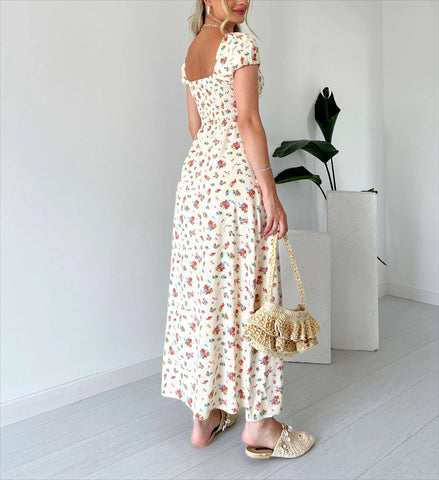 Vestido midi fruncido con estampado floral 