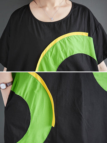 Vestidos midi holgados de manga corta con bolsillos de color en contraste y cuello redondo estampados 