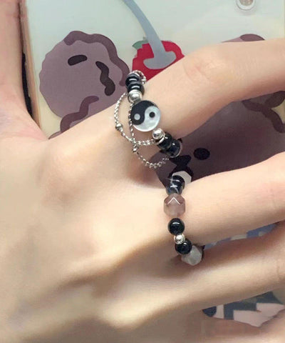 Schickes zweiteiliges Set mit Ringen in Farbblock-Optik und Edelsteinperlen 