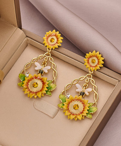 Conjunto de tres piezas de collar, pulsera y pendientes colgantes con borlas de perlas, girasol y circonita dorada vintage 