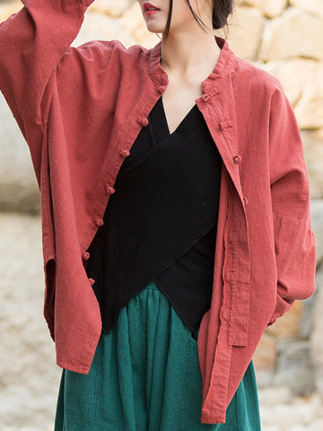 Blusas plisadas de color liso con cuello alto, mangas murciélago y botones de rana chinos sueltos. 