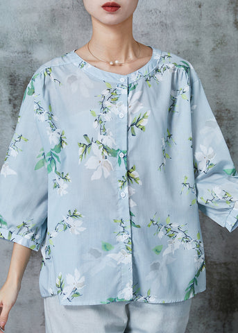 Blusa de algodón con estampado extragrande en azul claro y mangas tipo pulsera 