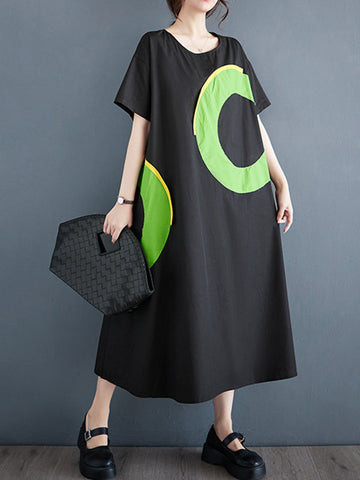 Vestidos midi holgados de manga corta con bolsillos de color en contraste y cuello redondo estampados 