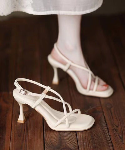 Sandalias elegantes de tacón alto con puntera abierta de piel sintética beige 