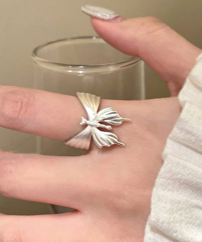 Anillos de apertura de mariposa de cobre y seda fina 