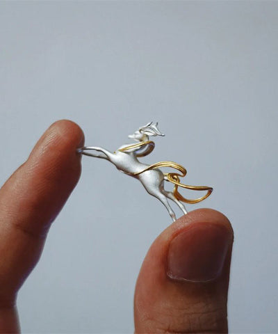 DIY Halskette aus neunfarbigem Hirschanhänger aus Seide und Sterlingsilber 