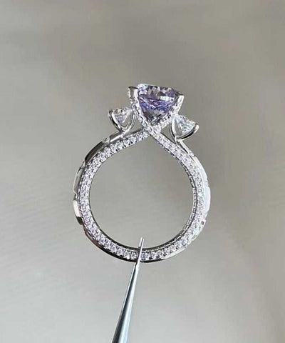 Anillos de cobre y circonitas moradas 