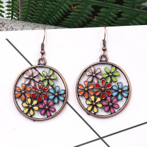 Pendientes de flores recortadas redondas de moda 
