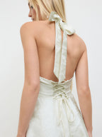 Vestido largo elegante de jacquard con cuello halter, sin mangas y estampado floral con cordones