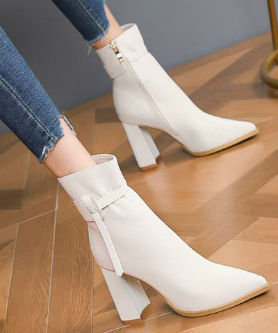 Elegante schwarze Kunstleder-Spleißstiefel mit spitzer Spitze 