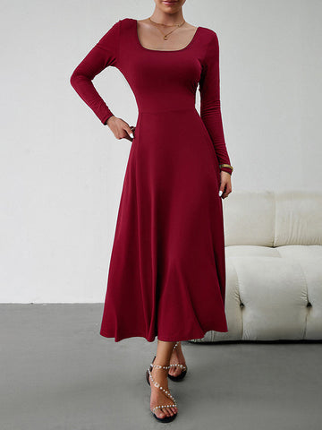 Vestidos midi de corte A, cintura alta, color liso, cintura anudada y cuello en U 
