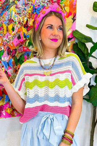 Suéter de punto de crochet multicolor con volantes 