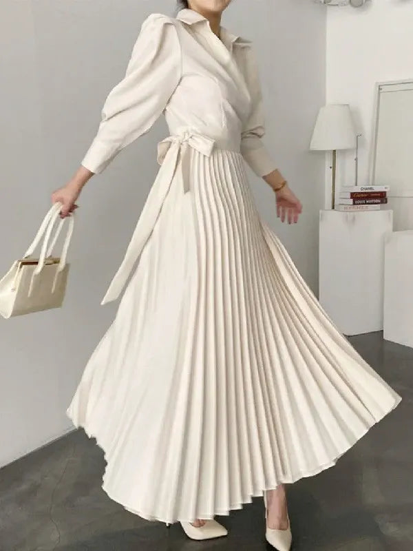 Elegante vestido de fiesta plisado asimétrico con solapa en color liso