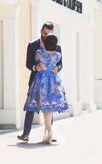 Zart besticktes Ballkleid mit langen Ärmeln