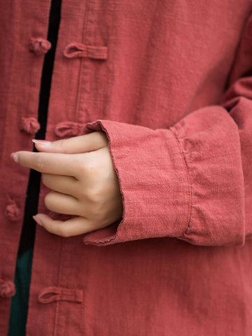 Blusas plisadas de color liso con cuello alto, mangas murciélago y botones de rana chinos sueltos. 