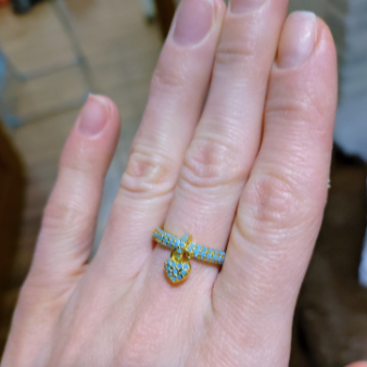 "Zirconia Love Knot: Heart Charm Rings"