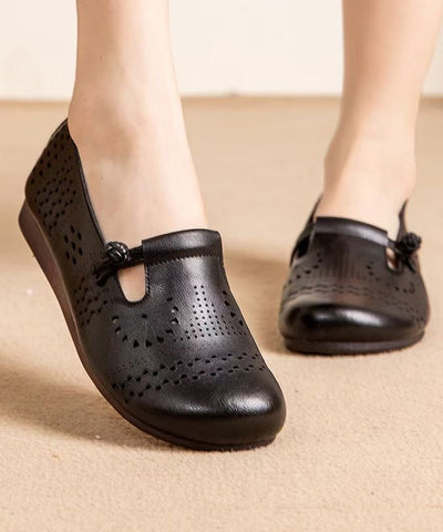 Zapatos planos negros retro de piel de vaca con agujeros 
