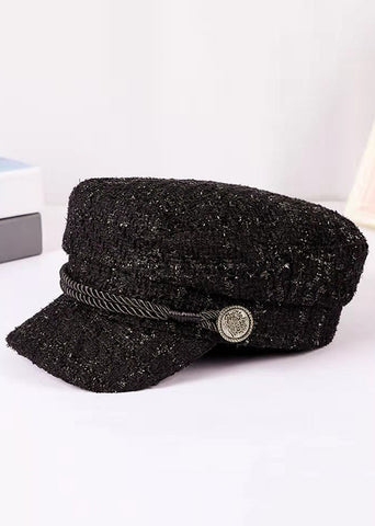 Modische schwarze Baskenmütze mit Patchwork-Muster 