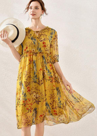 Vestido de verano de gasa con estampado bohemio rosa y media manga 