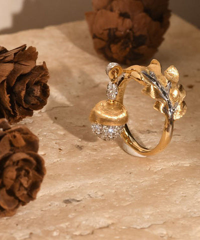 Anillos únicos de borlas de piñones con circonitas doradas y plata esterlina 