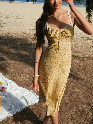 Vestido midi de tirantes con estampado floral bohemio 