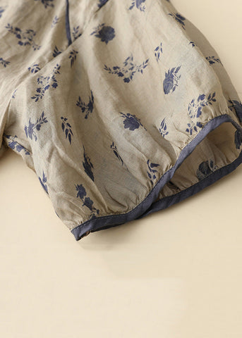 Camiseta holgada de algodón con botones y estampado caqui, mangas con pulsera 