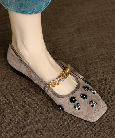 Zapatos planos con lazo y cuentas para mujer de ante negro 
