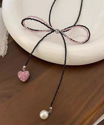 Moderne schwarze Zirkon Perlen Fliege Spitze Perle Liebe Anhänger Halskette 